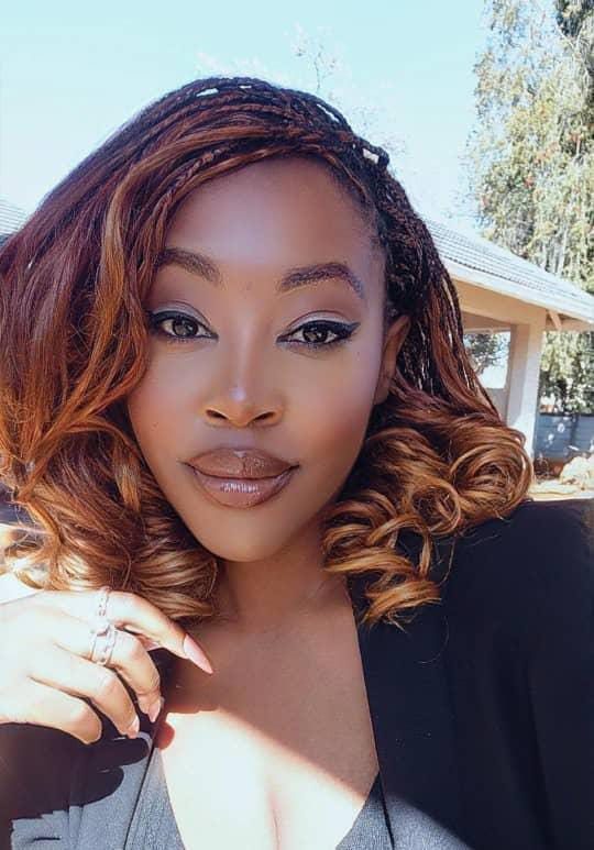 Long auburn ombre braids with curled ends