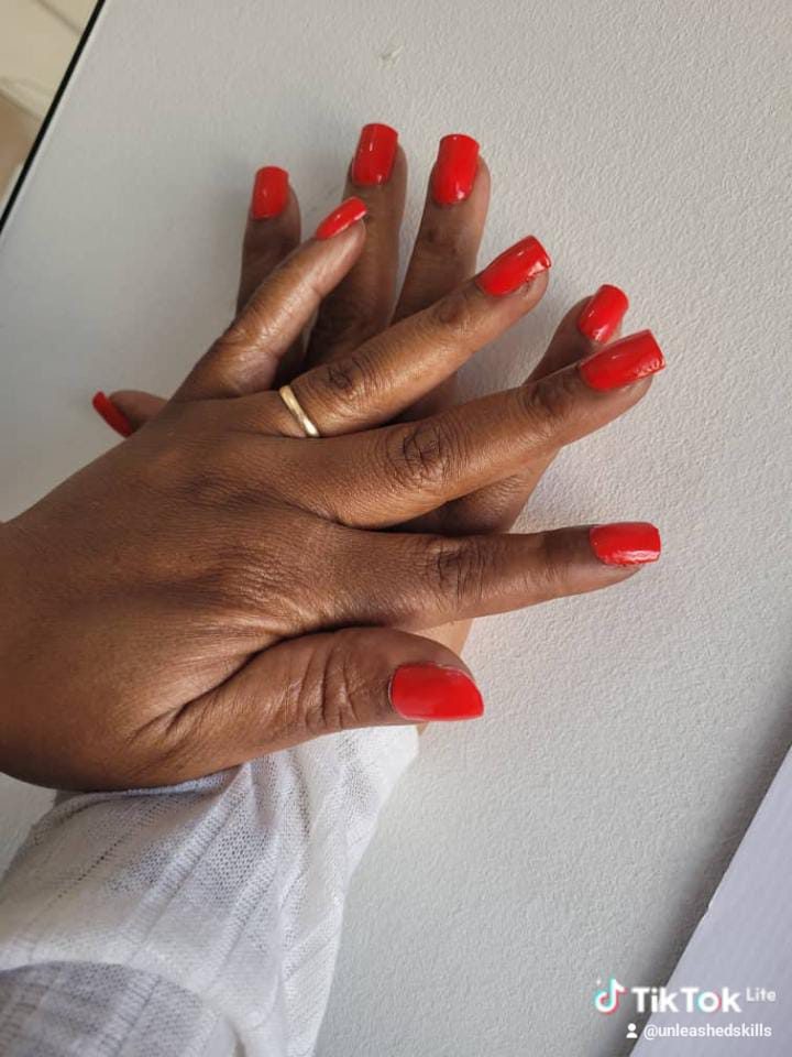 Bold red square-tip manicure