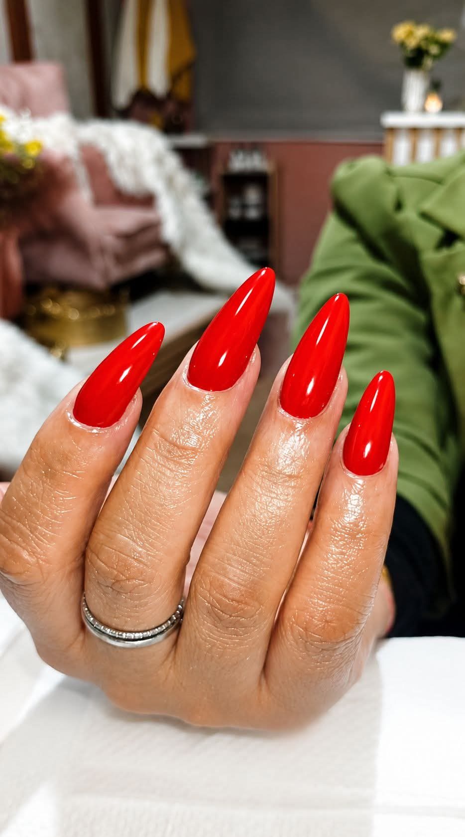 Glossy red stiletto nails