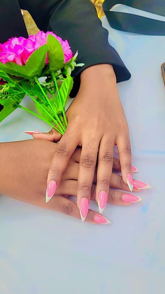 Pink and white almond-shaped nails