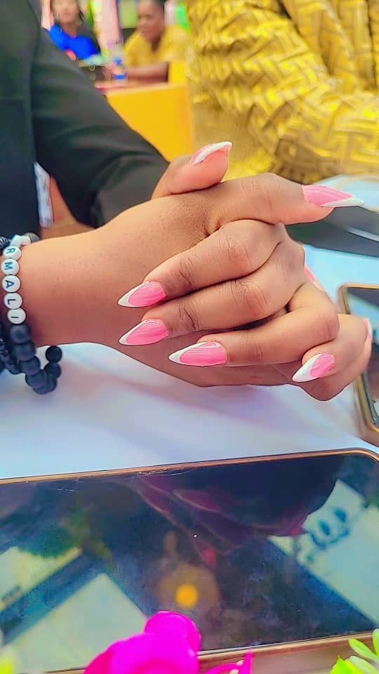 Pink and white French-tip almond nails